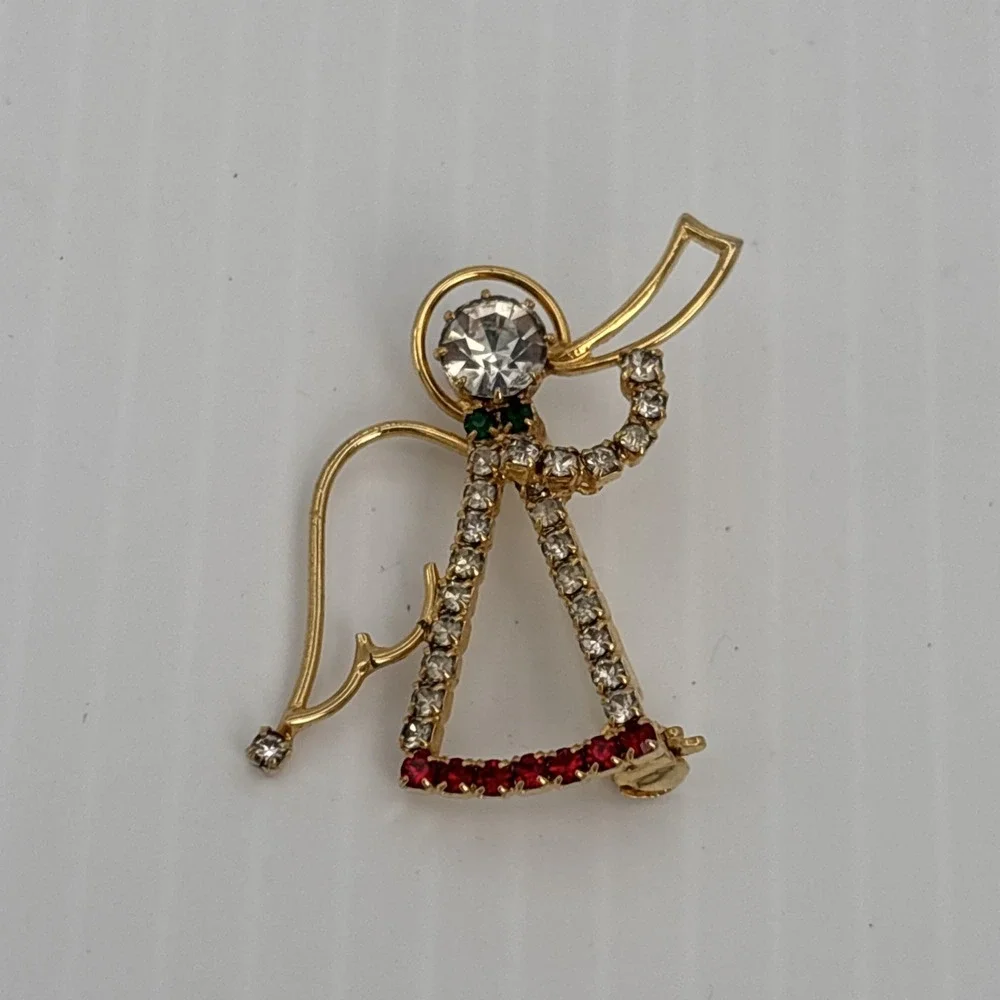 Vintage Rhinestone Angel with Trumpet Gold Tone Brooch Pin Red Clear Green